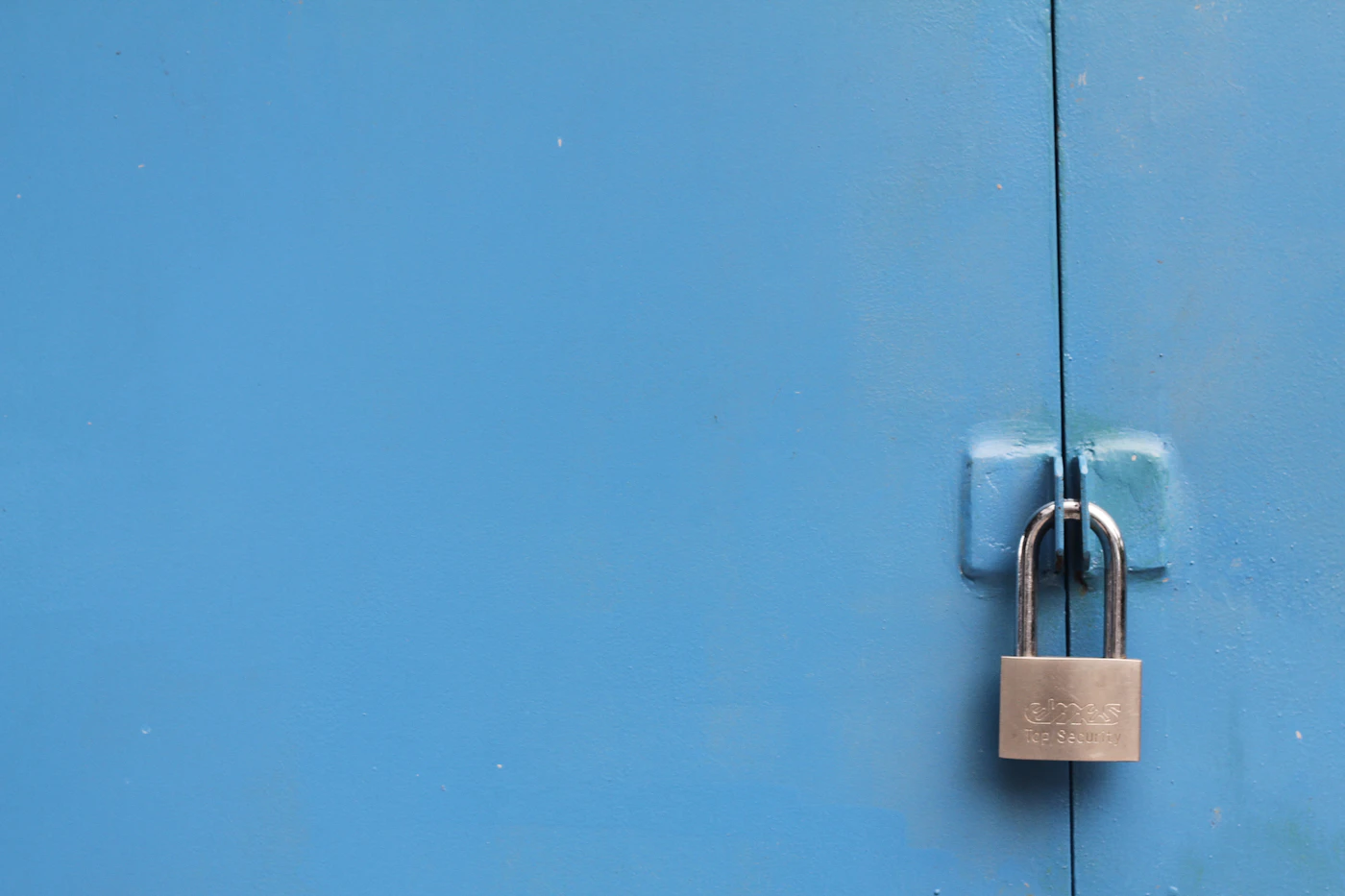 Padlock on a door, emergency lockout service in Mason OH