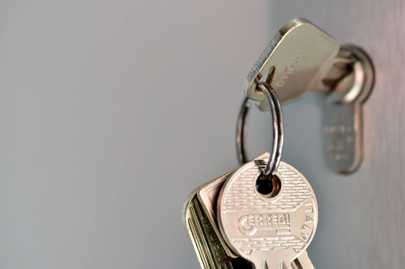 Set of house keys hanging on a hook, residential locksmith